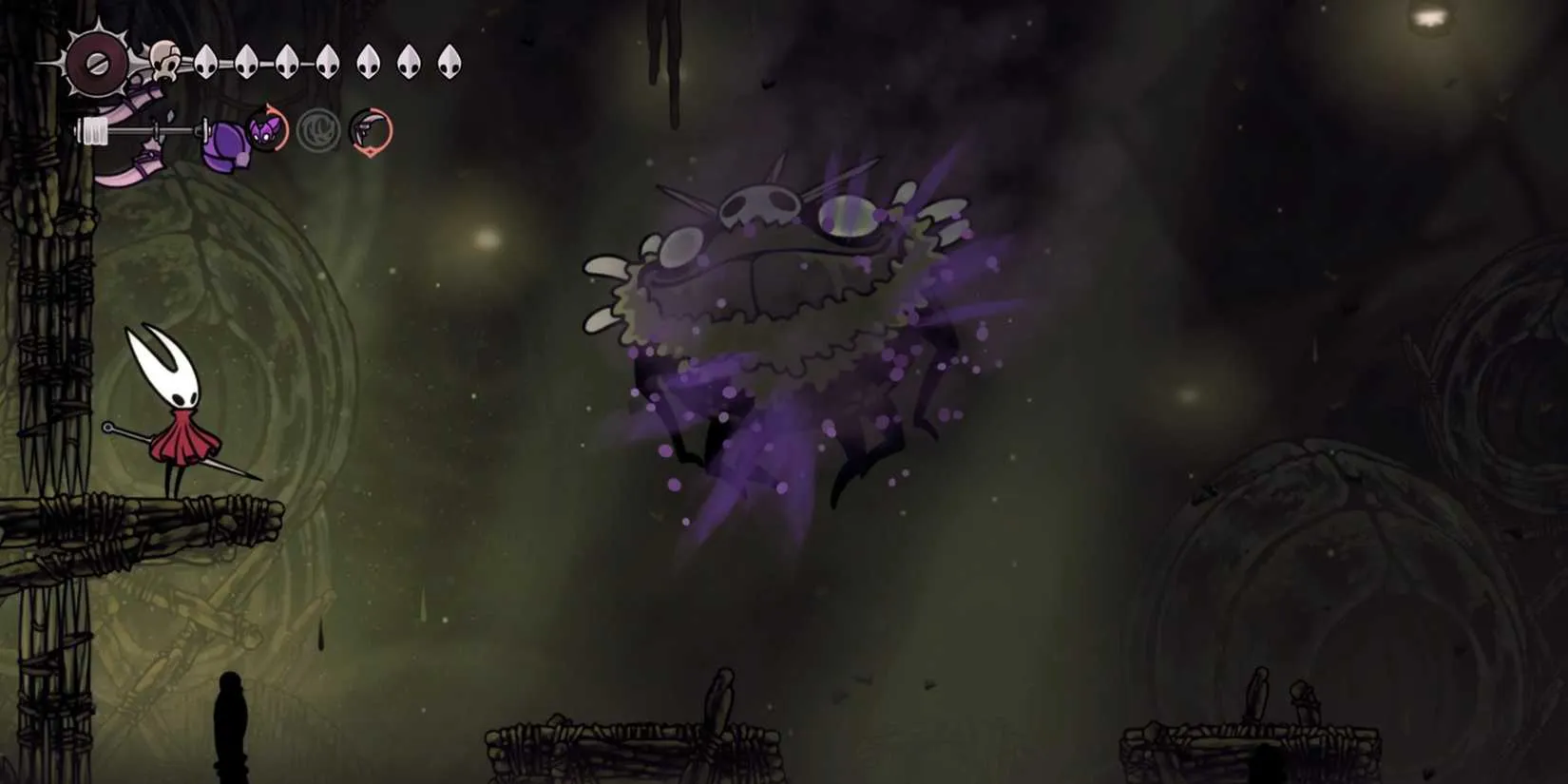 A massive, slug-like boss surrounded by fire and spawning insect minions