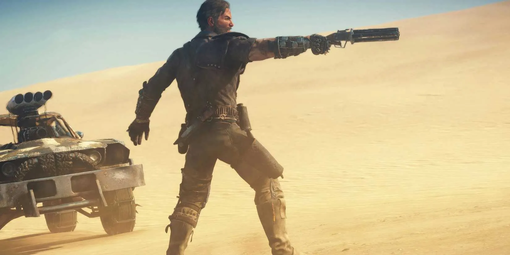 main character Max pointing his gun in Mad Max