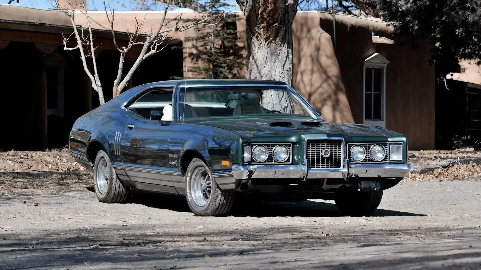 Side profile of a 1972 Mercury Montego GT Cyclone, highlighting the aggressive fastback design