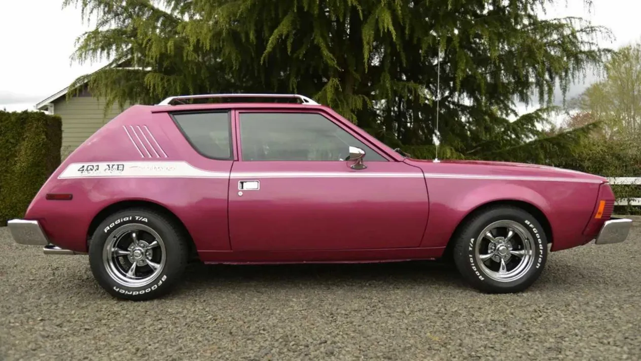 The side profile of a rare and understated 1973 AMC Gremlin 401-XR with Randall Brothers decals
