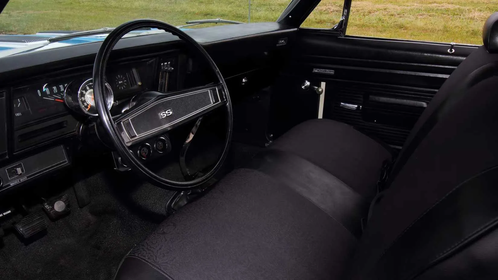 1969 Chevrolet Yenko Nova 427 interior with driver-side view