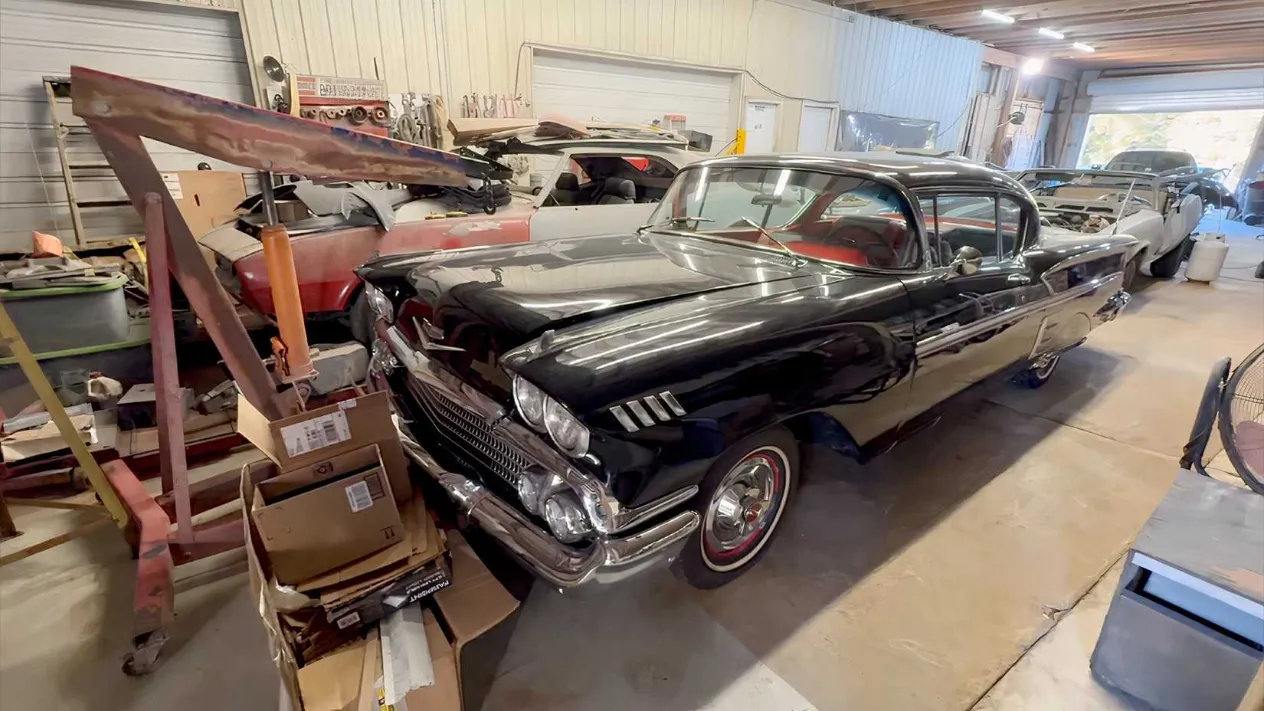 A lineup of classic muscle cars awaiting their turn