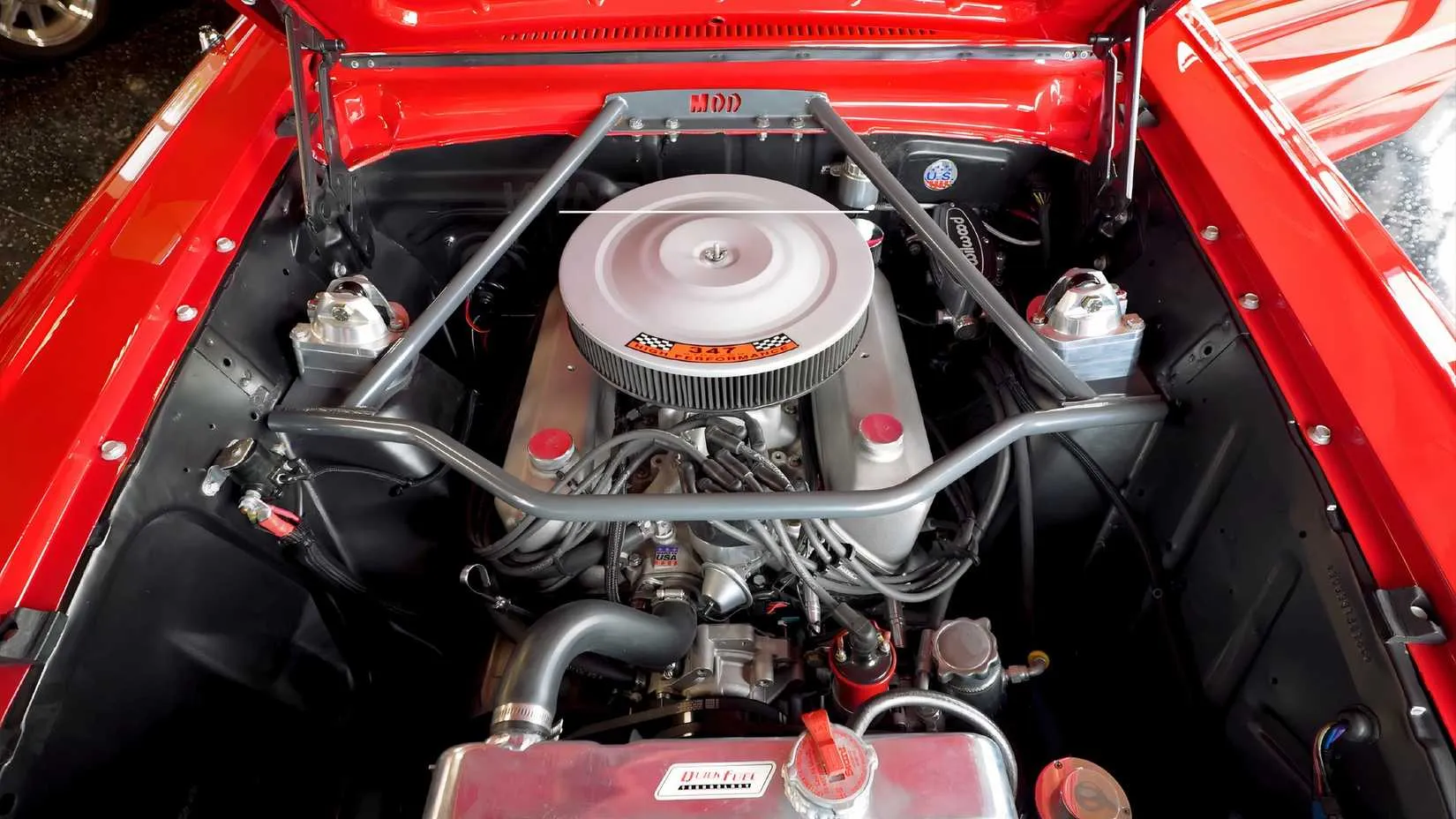 Close-up of the modified fender and wheel of the Ford Falcon