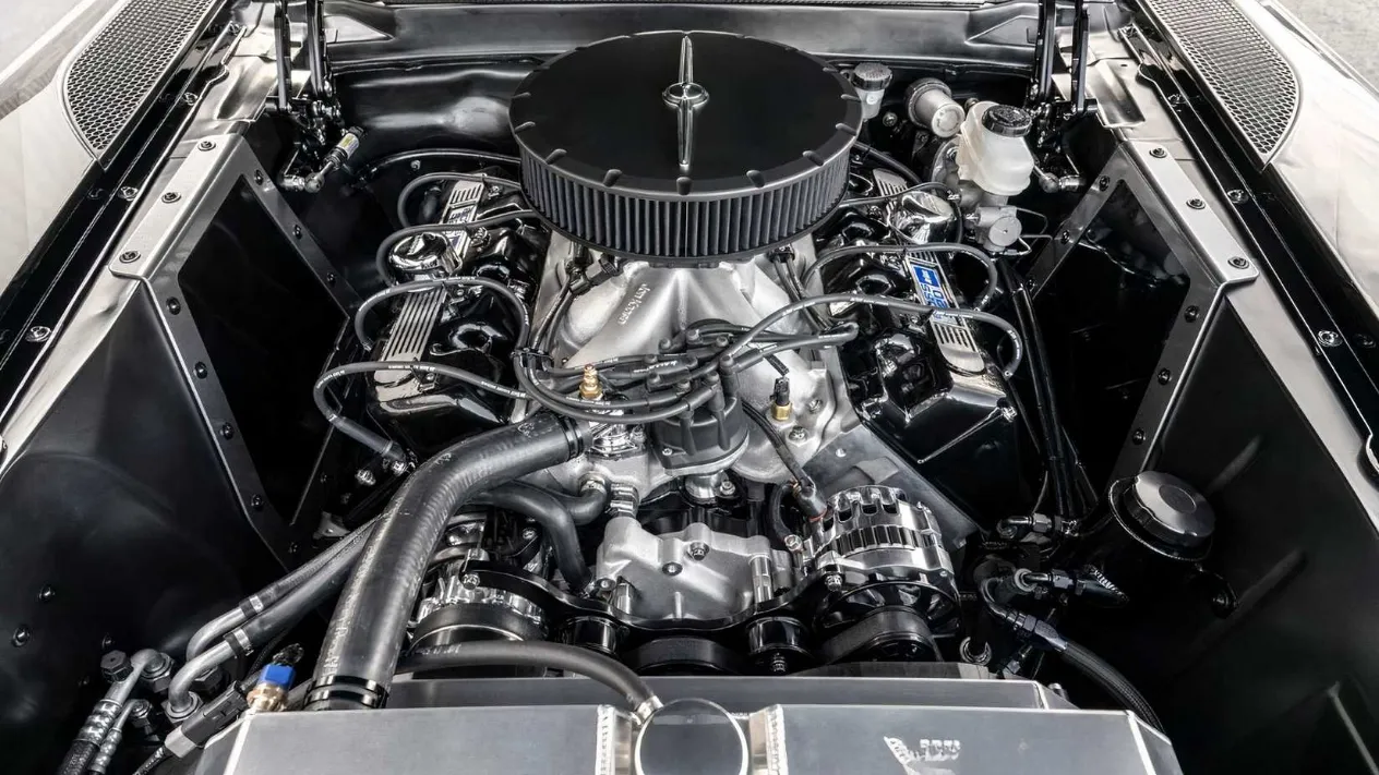 A close-up of the custom engine bay housing the 7.0-liter Kaase Boss Nine V8