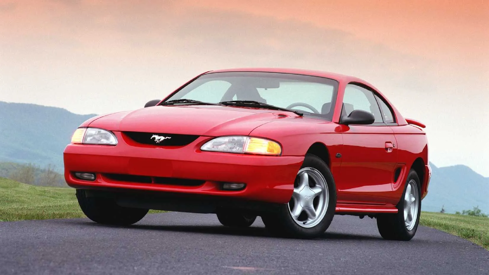 Red 1996 Ford Mustang Fourth Gen from front