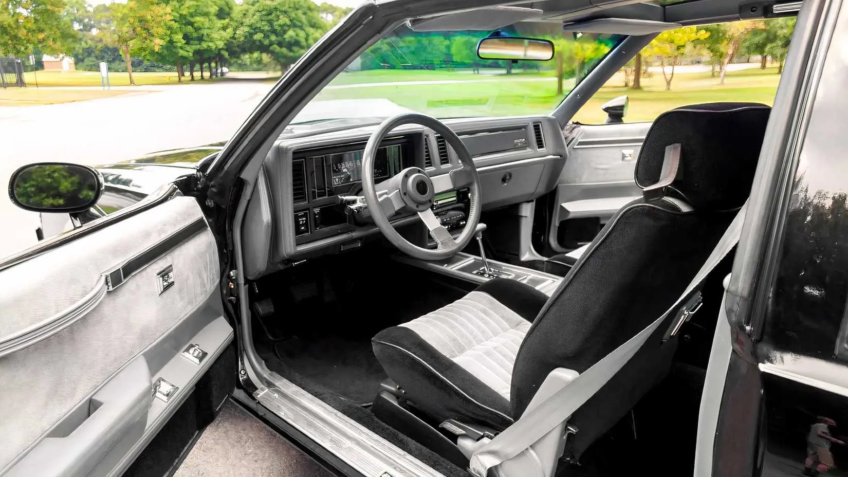 The rear end of a 1987 Buick Grand National, showing off its menacing, uncluttered design