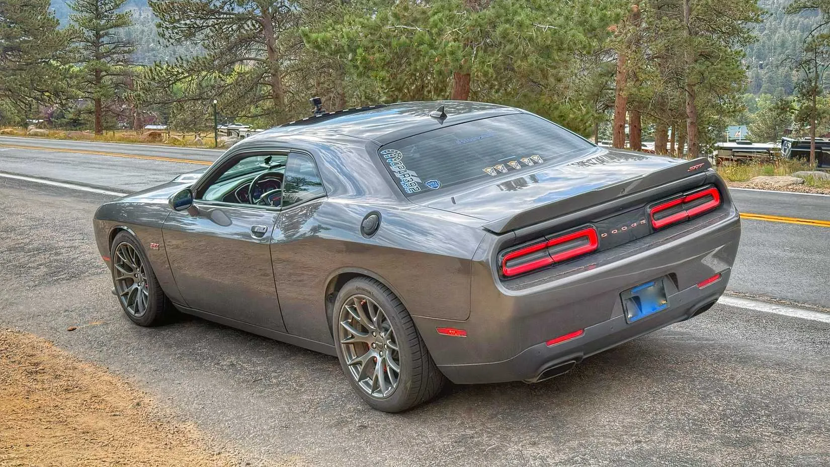 The rear view of the Challenger SRT 392, its stance still purposeful despite the miles accumulated