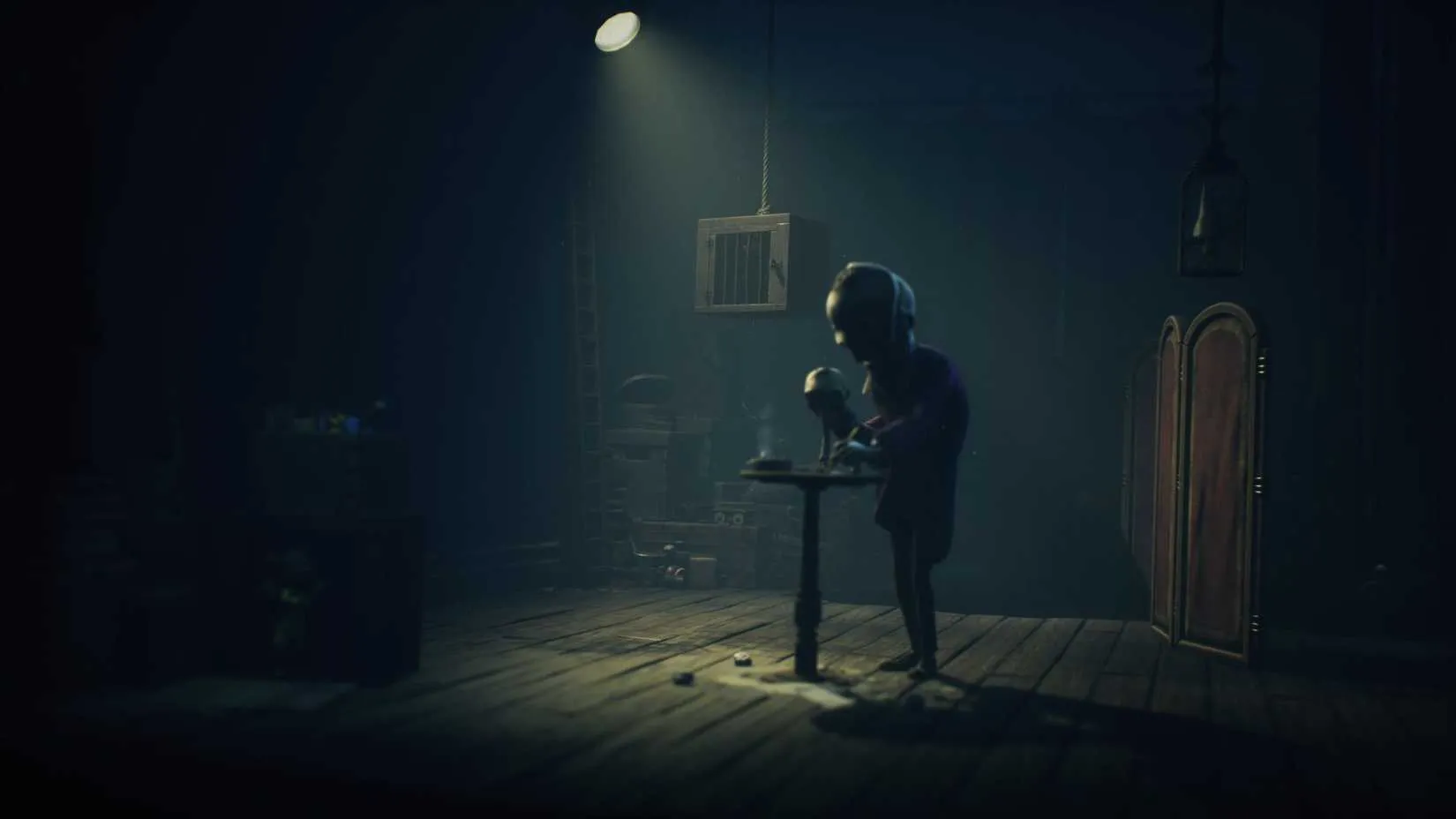 Alone and Low creeping through a dimly lit corridor with a monstrous silhouette looming ahead