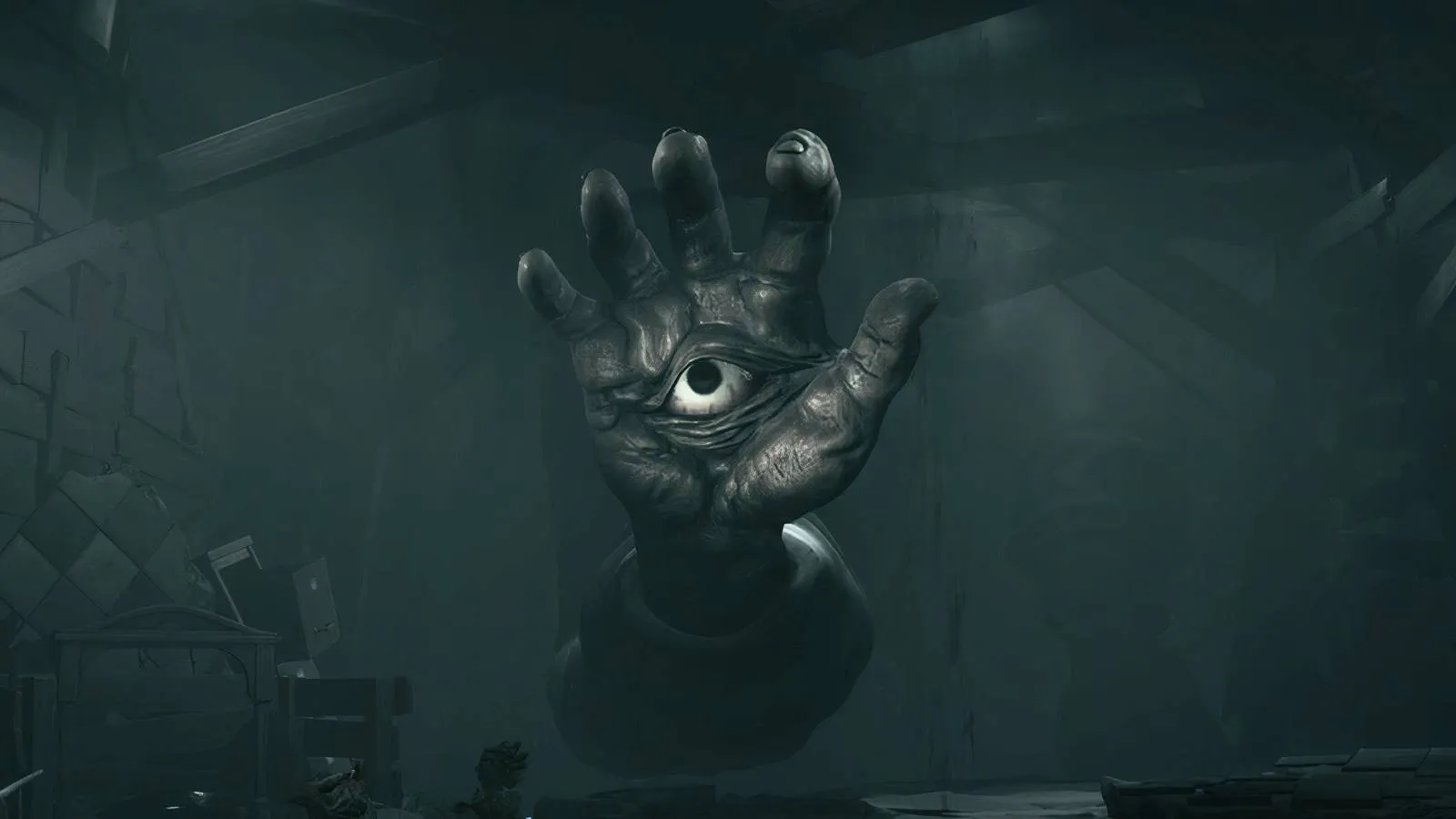 A hand with an eyeball in the middle in Little Nightmares 3