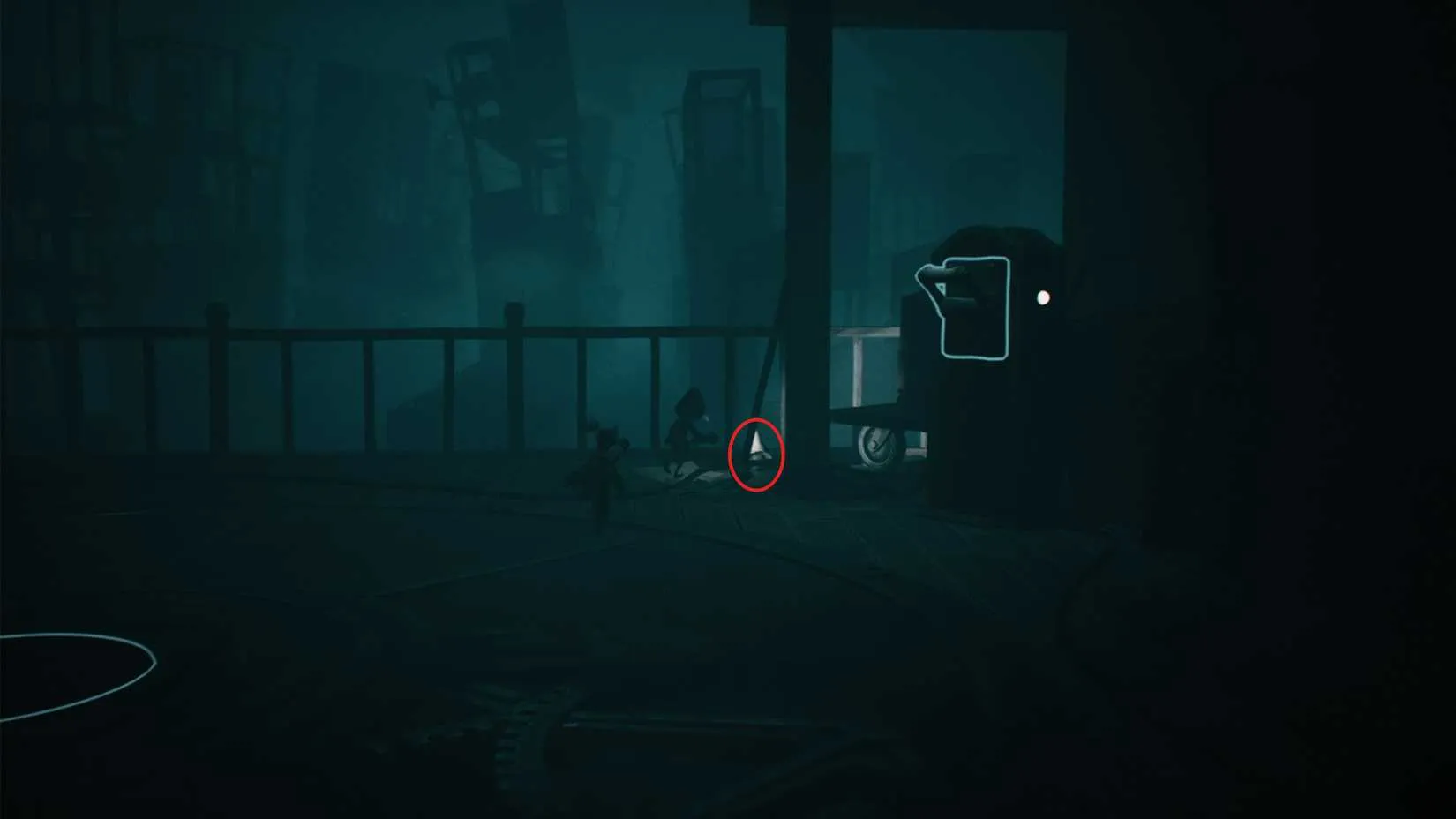 The third Nome hiding in the upper-right corner of the dark room after running away from the button puzzle