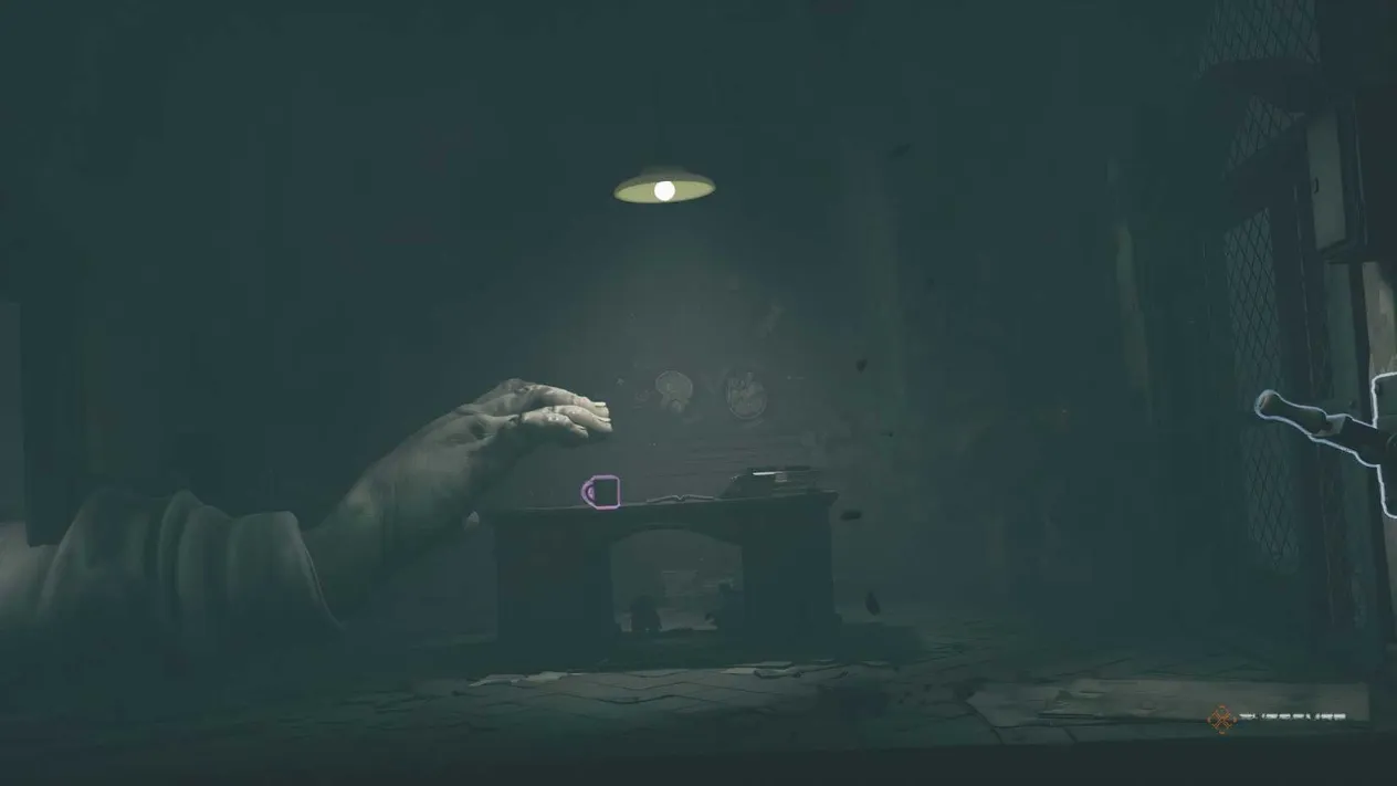 Low and Alone hiding from a hand in Little Nightmares 3