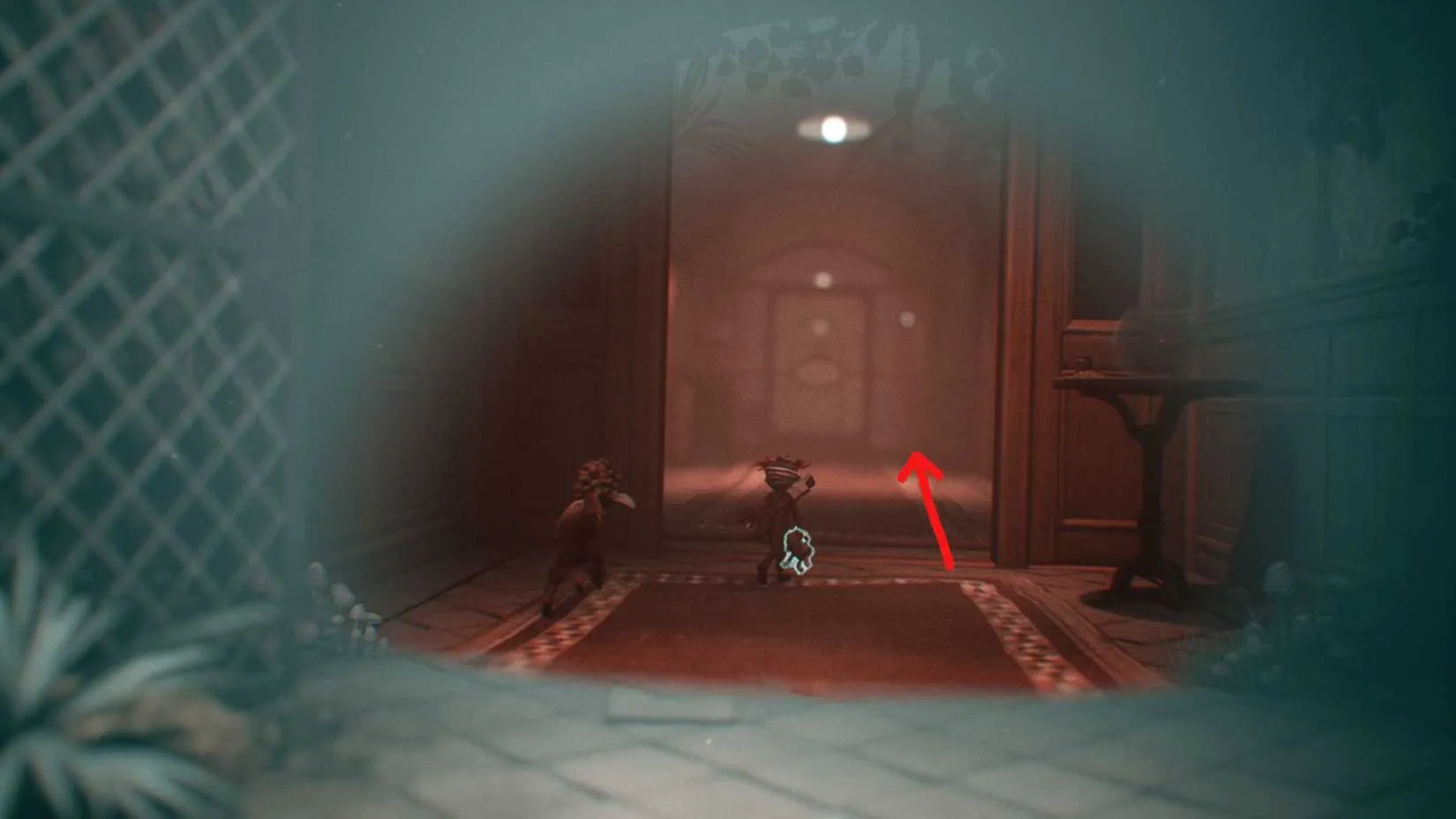 Tossing the glowing doll through the window near the seesaw