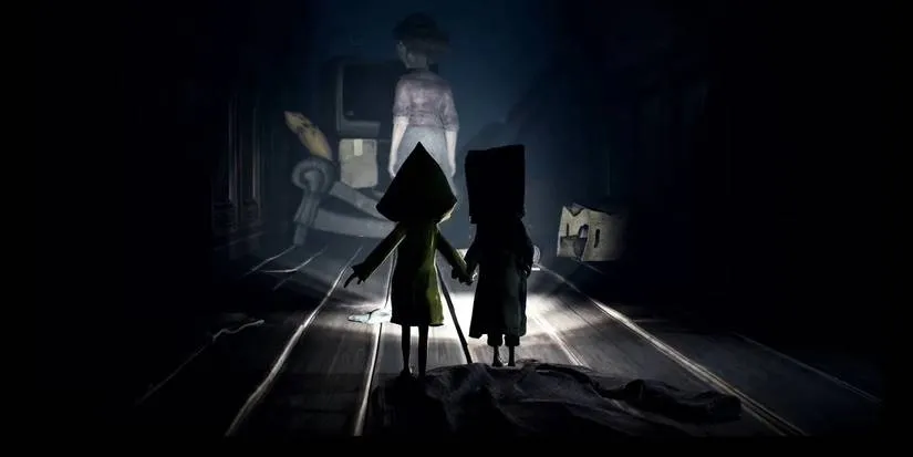 Mono and Six walking cautiously side by side through a decayed corridor in Little Nightmares 2