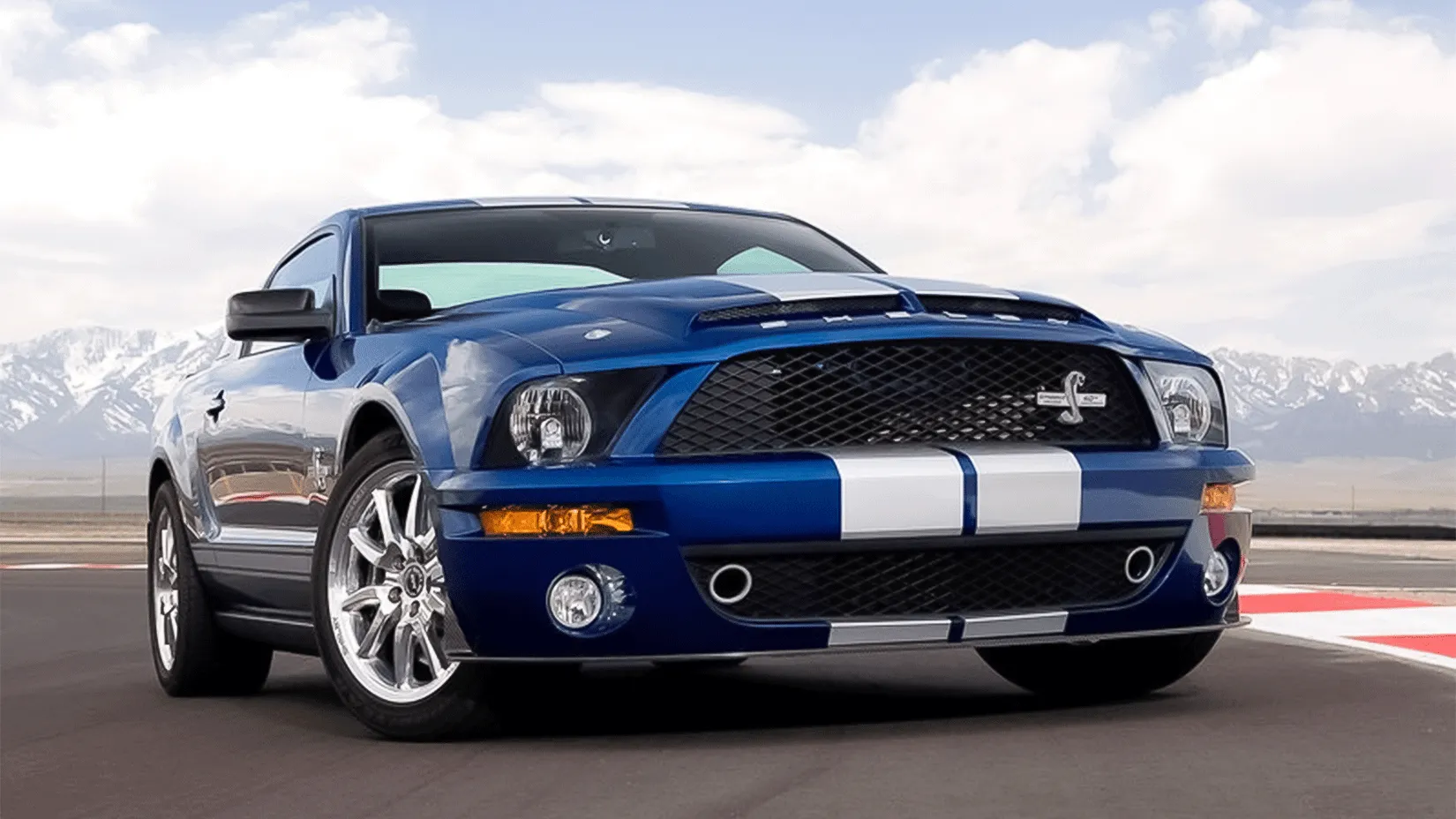 A blue Ford Mustang Shelby GT500KR growling its regal title