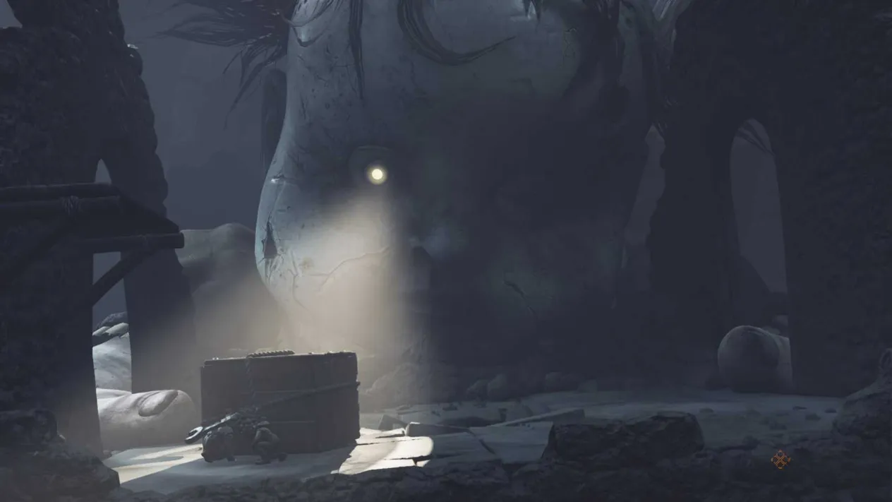 Low and Alone hiding behind a crate from Monster Baby