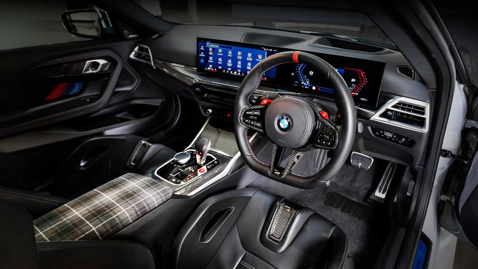 BMW 333i Homage interior showing tartan upholstery and 1 of 33 plaque