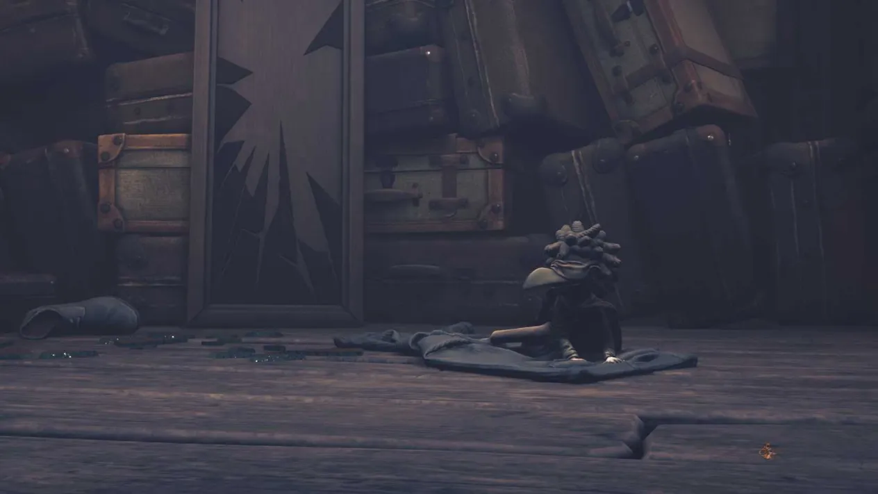 Low kneeling in exhaustion on the cold floor, alone in a pool of dim light