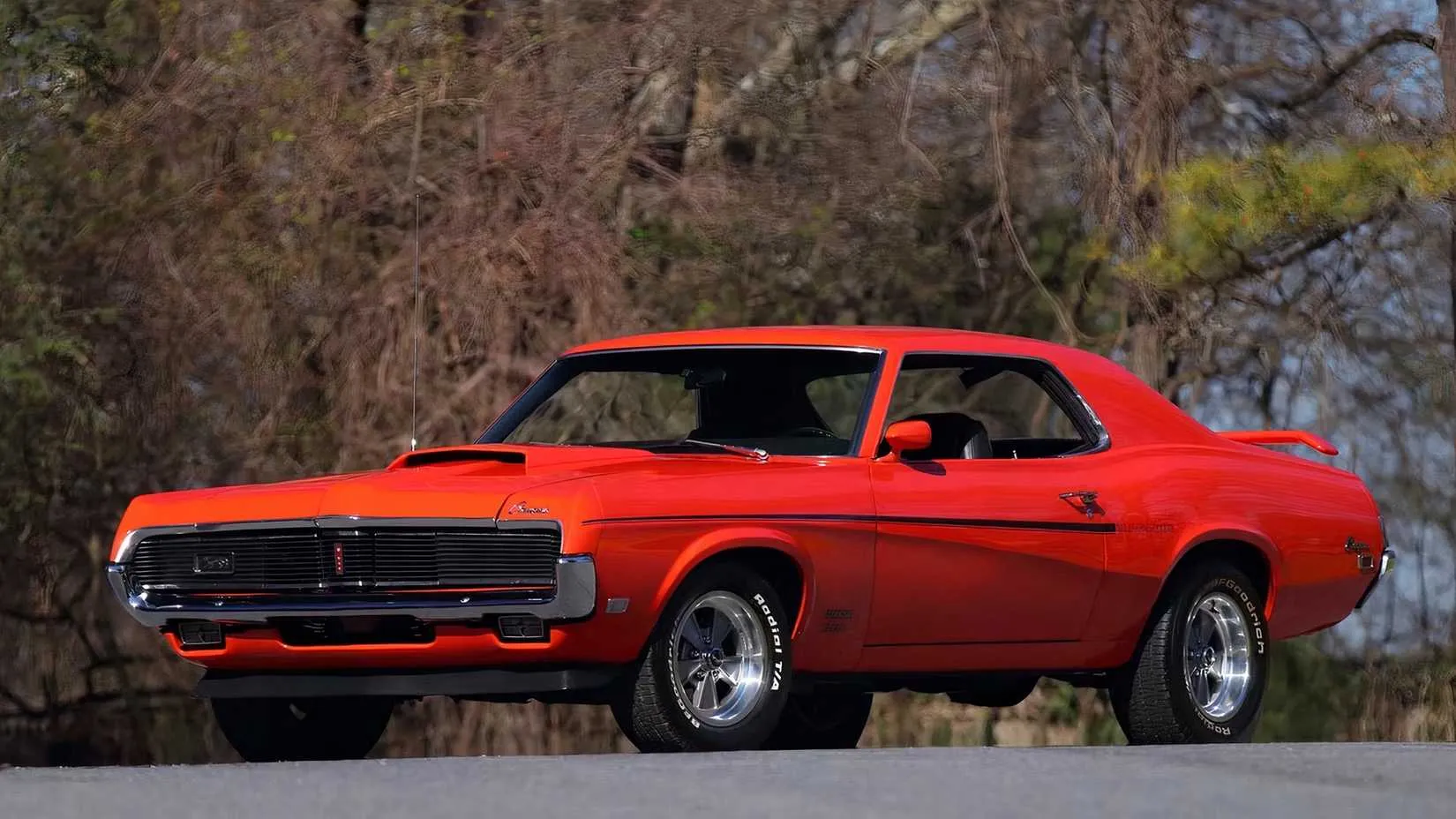 1969 Mercury Cougar Eliminator in side profile, showing off its aggressive muscle stance