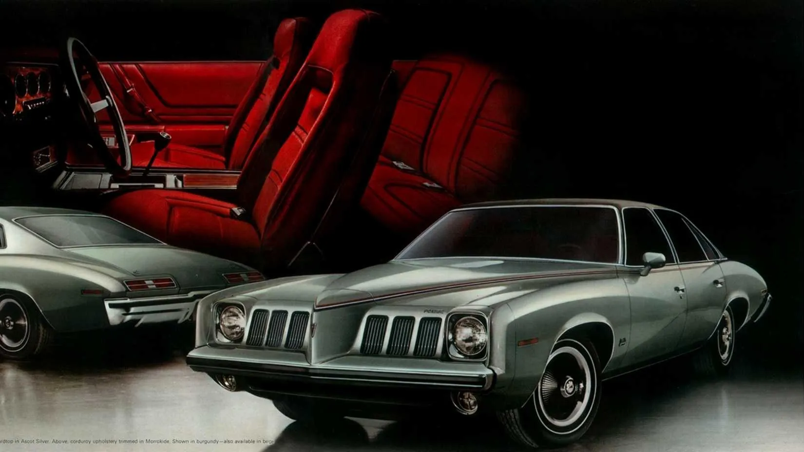 A restored 1973 Pontiac Grand Am in motion, showing its profile and rear window lines, captured during a drive