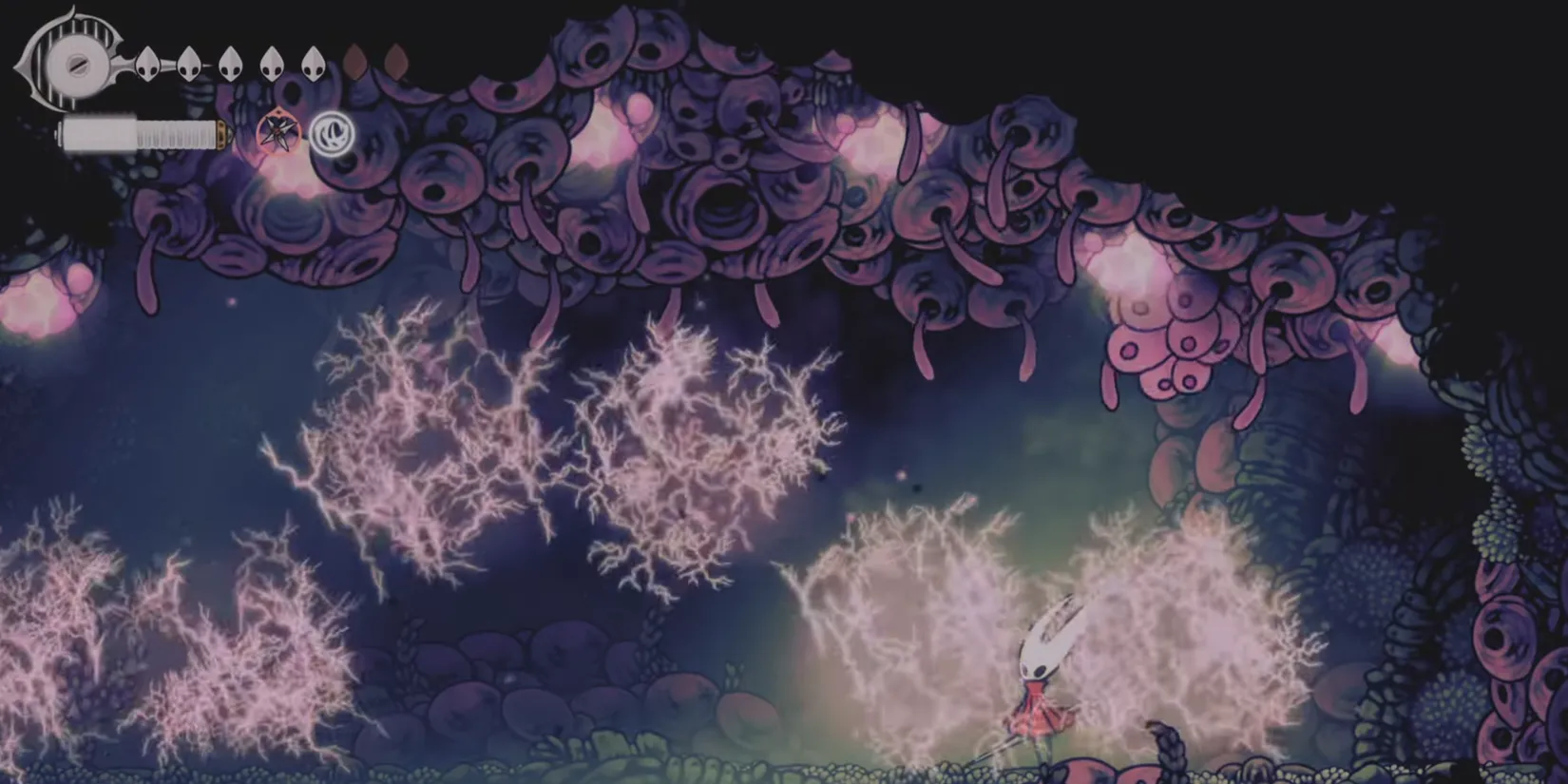 A static electric wyrm embedded in a wall, firing slow lightning orbs
