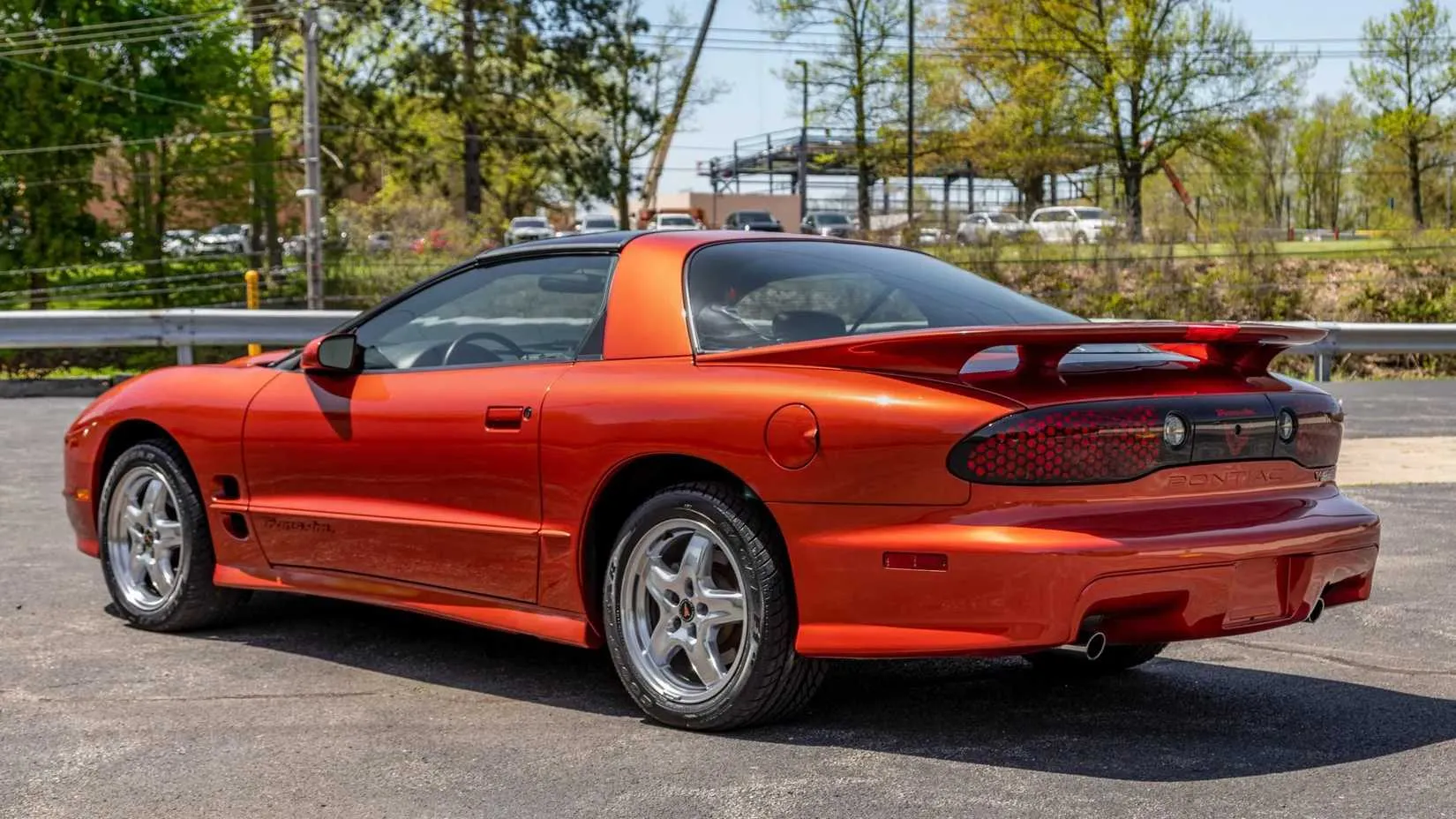 A black 2002 Pontiac Firebird Trans Am WS6 showing the Ram Air hood
