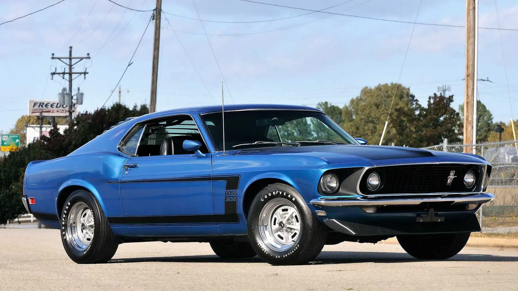 1969 Ford Mustang Boss 302 on a twisty road