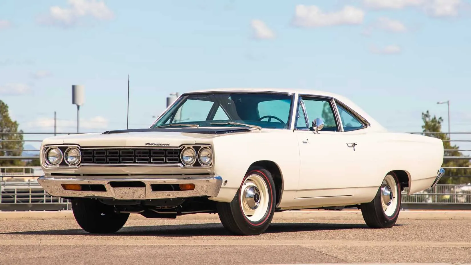 White 1968 Plymouth Road Runner front on road