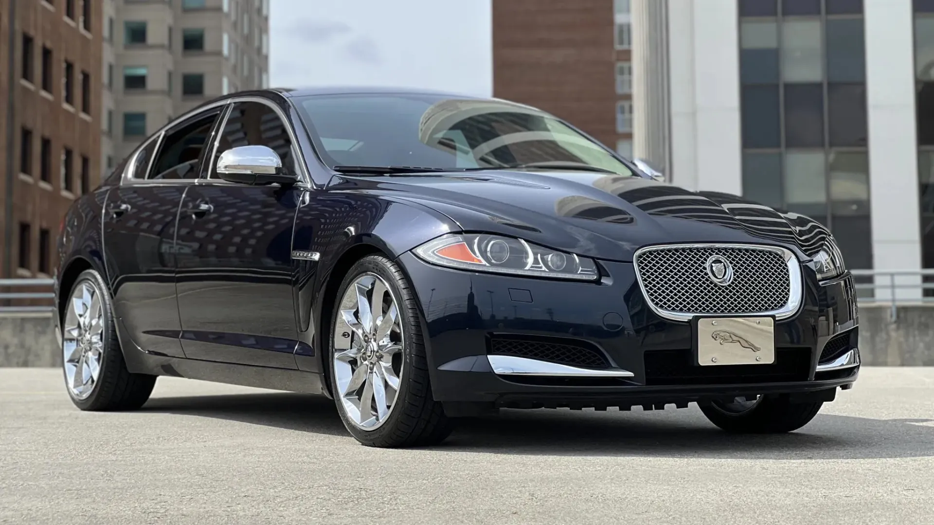 A 2012 Jaguar XF Supercharged in a classy color, showcasing its elegant yet aggressive design.