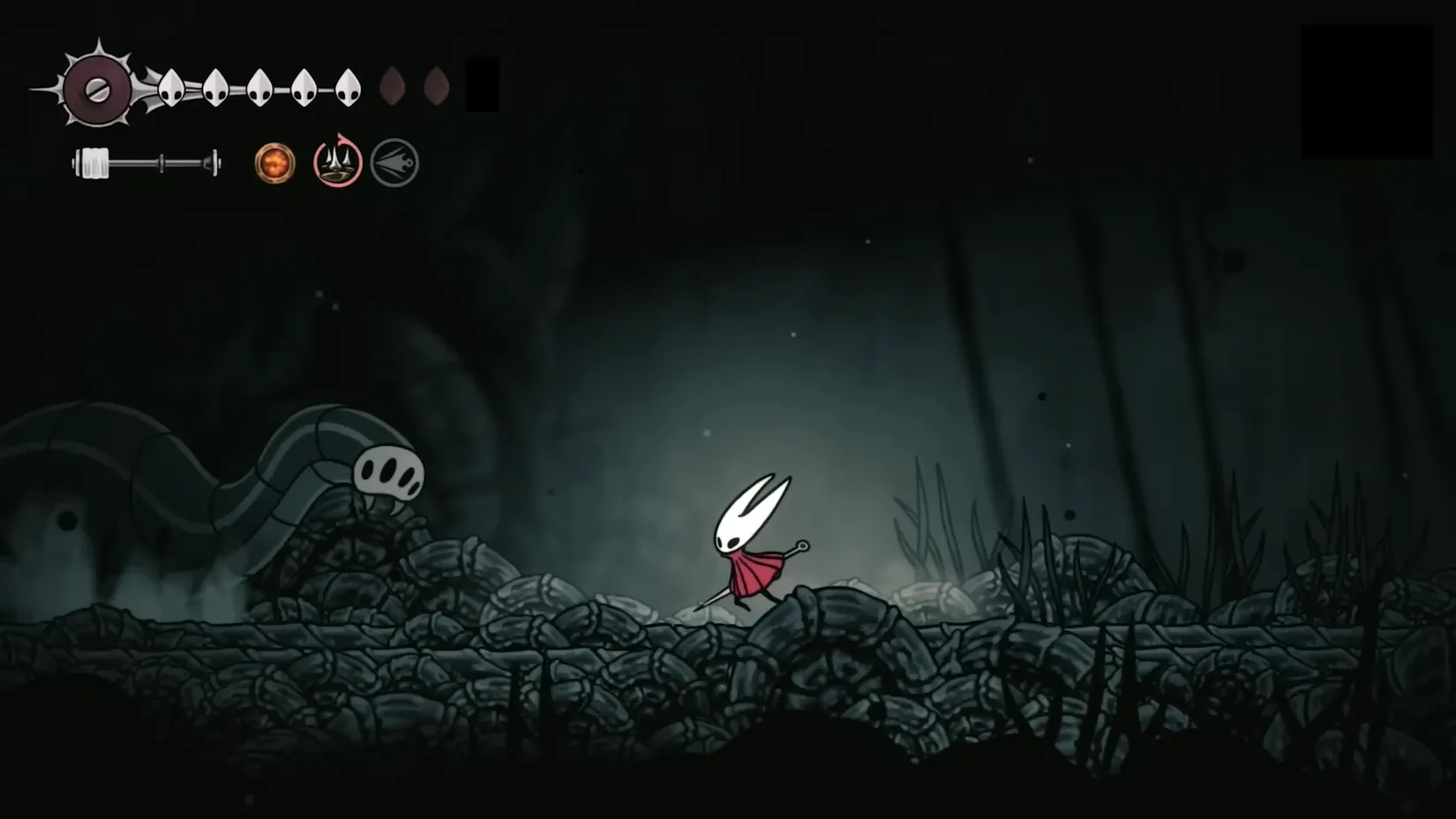 A towering Gargant Gloom stands menacingly in the dark corridors of The Abyss, its massive hitbox promising a world of hurt.