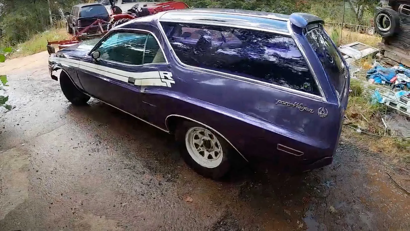 Rear view of the unique 1971 Dodge Challenger R/T SE wagon conversion, showing the hand-formed panels, large rear glass, and the tailgate element reminiscent of an AMC Gremlin.