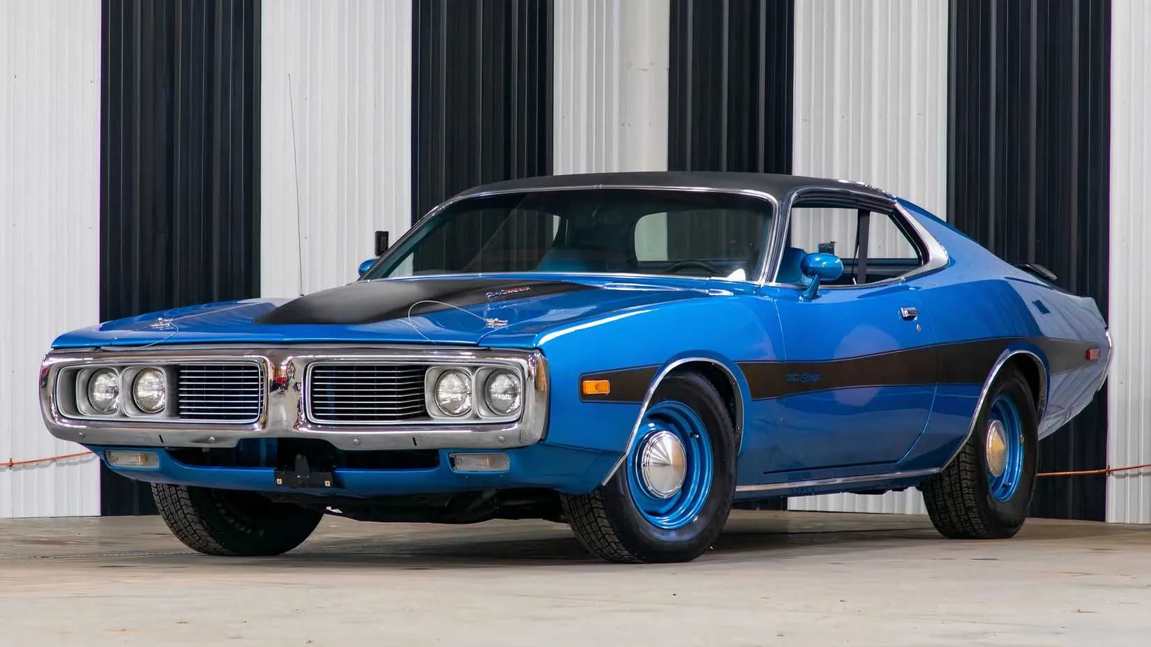A well-preserved 1973 Dodge Charger Rallye with a power bulge hood