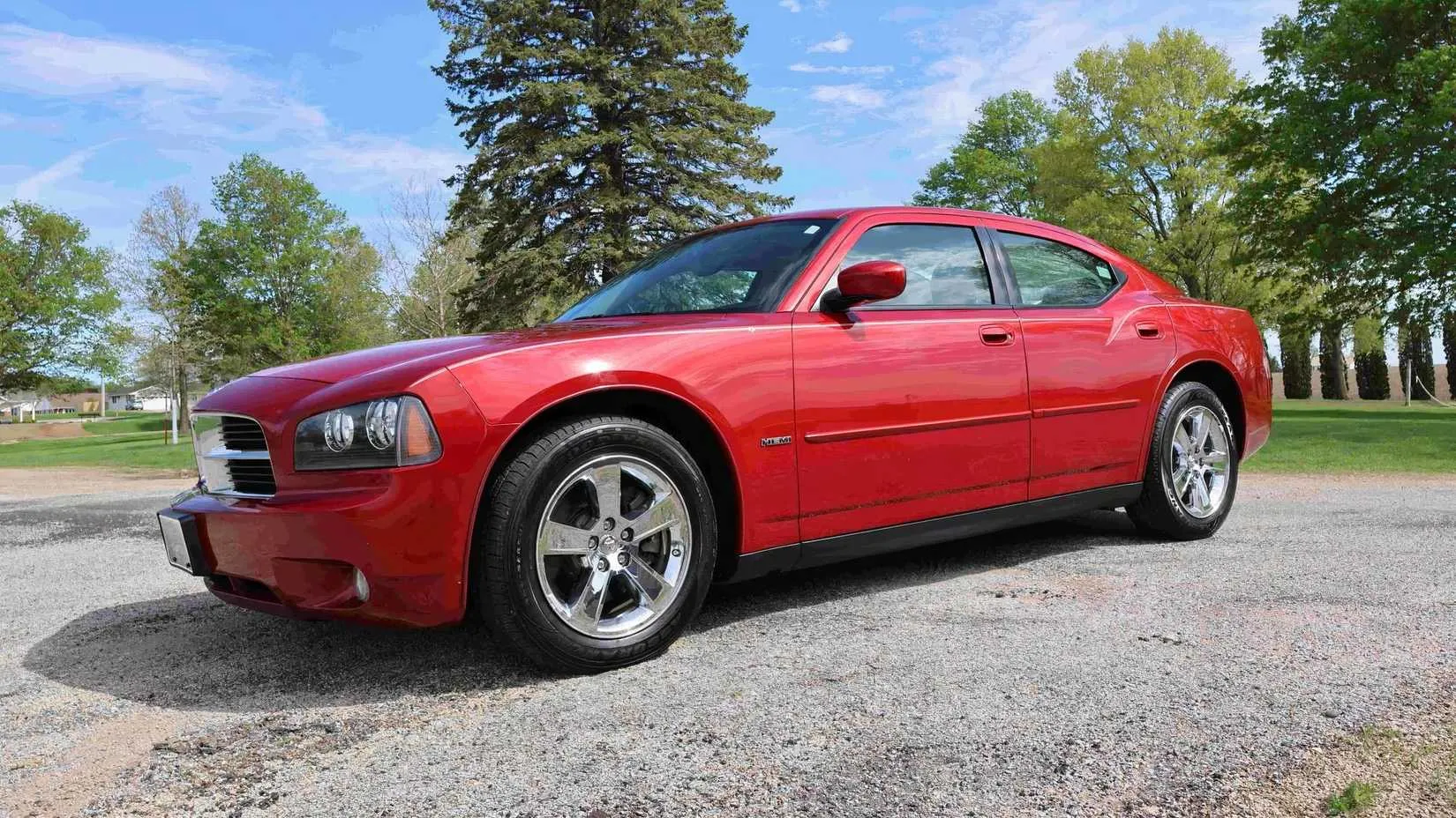 A modern 2007 Dodge Charger R/T, showing the familiar but four-door silhouette