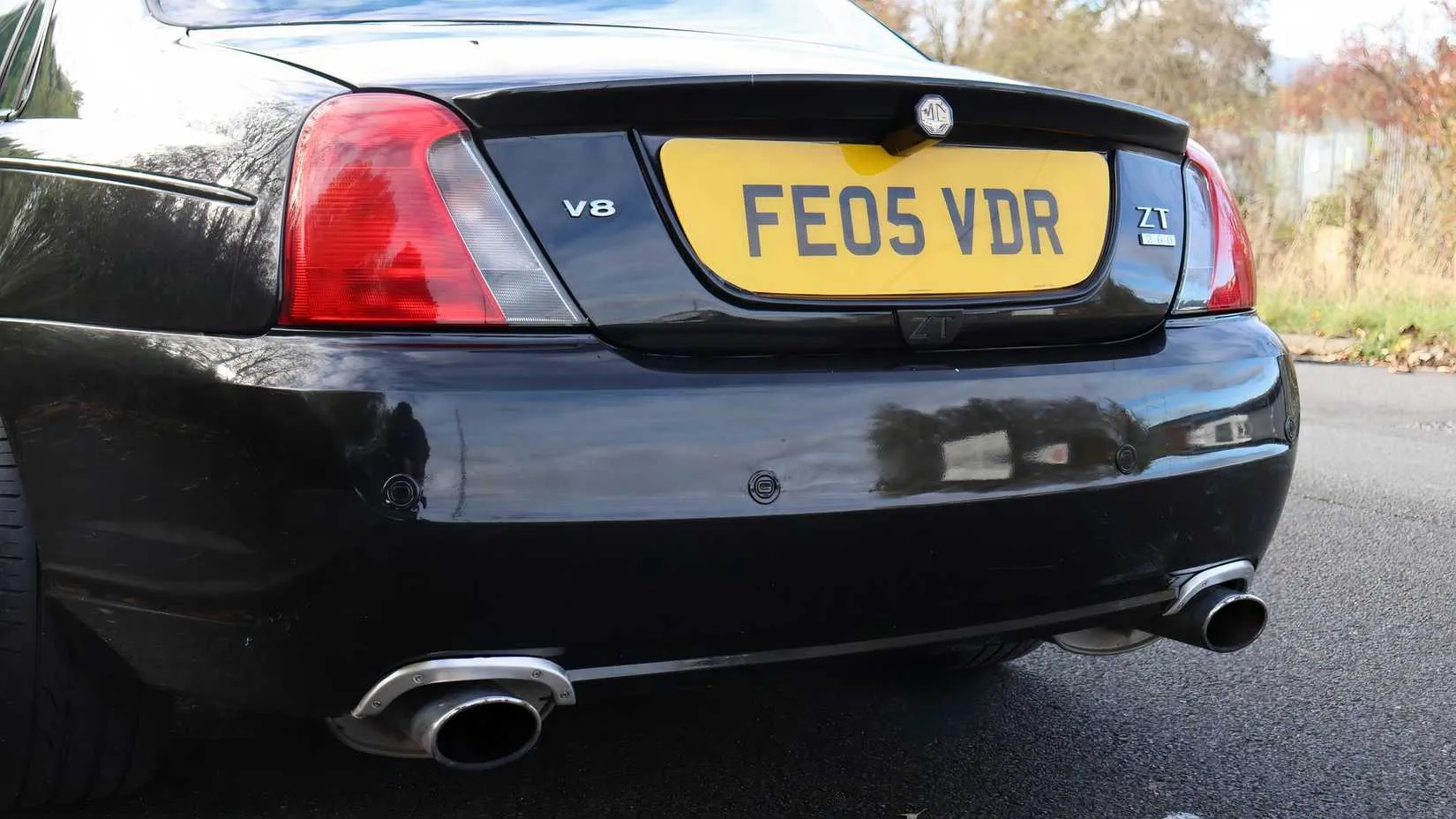 The back of a 2005 MG ZT 260, showing its subtle badging and those tell-tale twin exhausts