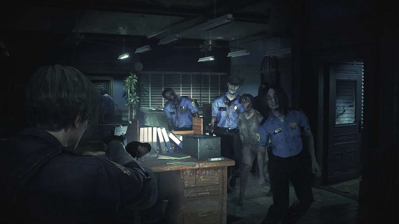 Leon aiming his pistol at a zombie in Resident Evil 2 remake