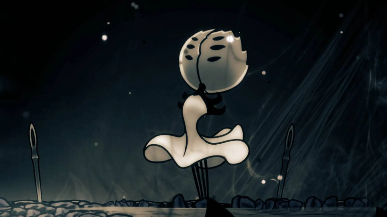 A mysterious coffin-like structure chained in a dark chamber, hinting at the First Sinner&rsquo;s lair