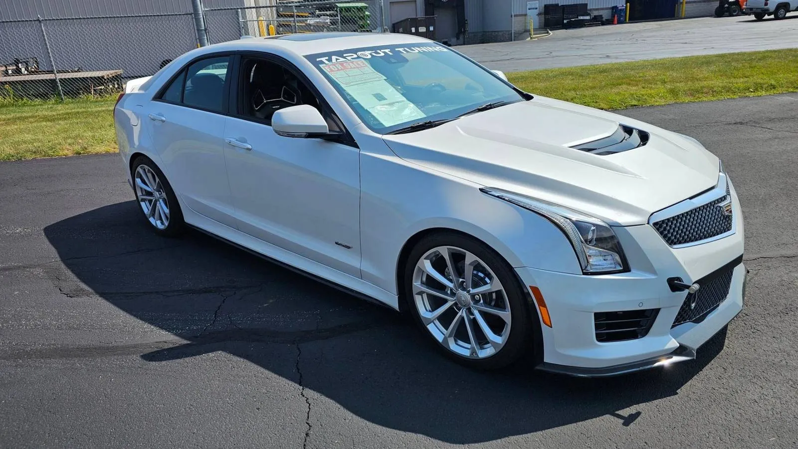 Front three-quarter view of a heavily modified 2018 Cadillac ATS-V