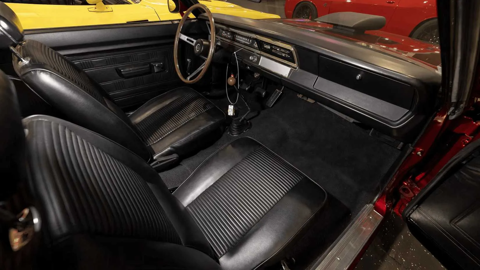 Interior of the 1969 Dodge Dart Swinger Concept showing bucket seats, gauges, and Hurst shifter