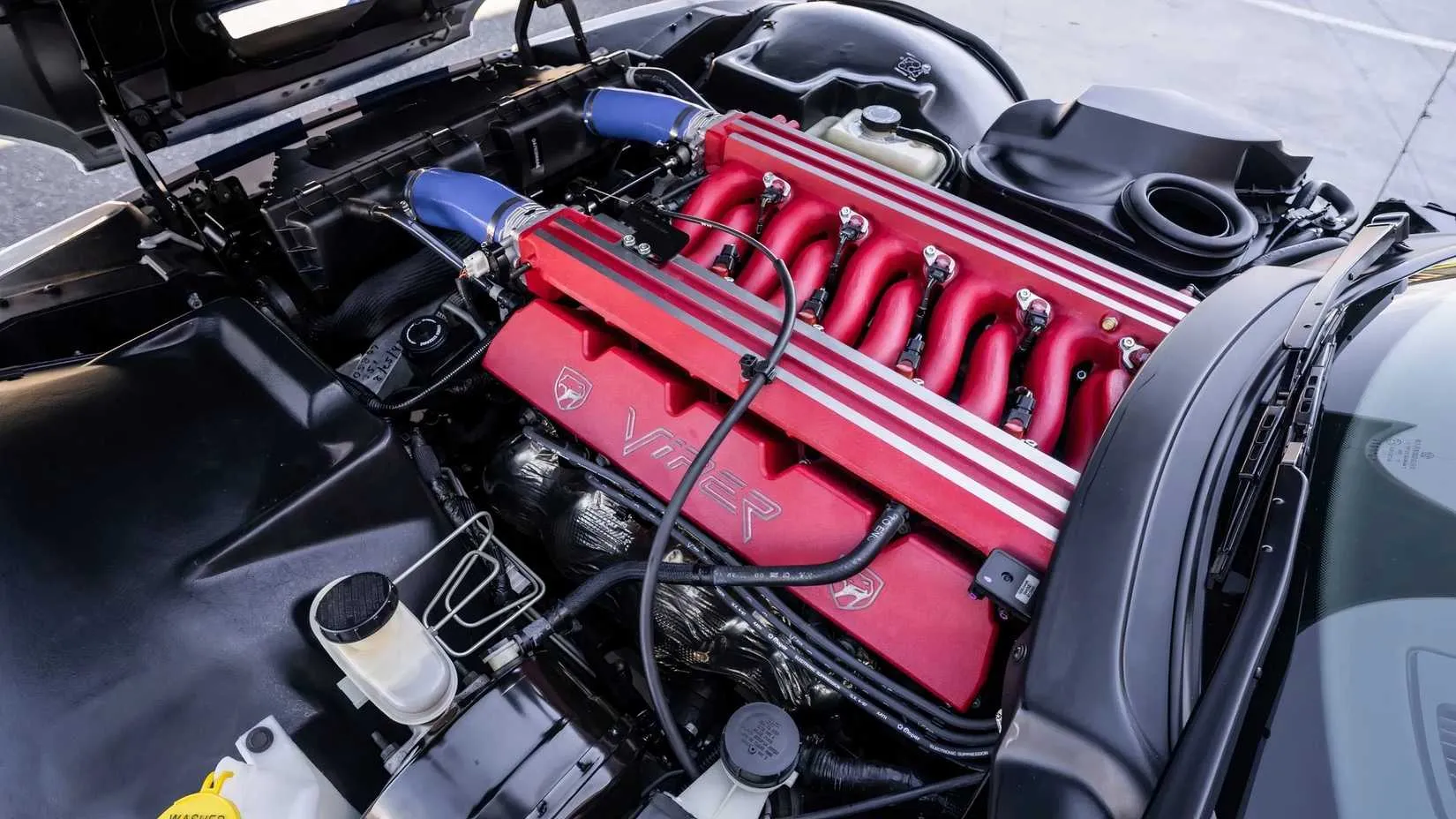 Close-up of the 8.0-liter V10 engine in a 1998 Dodge Viper GTS GT2 Champion Edition
