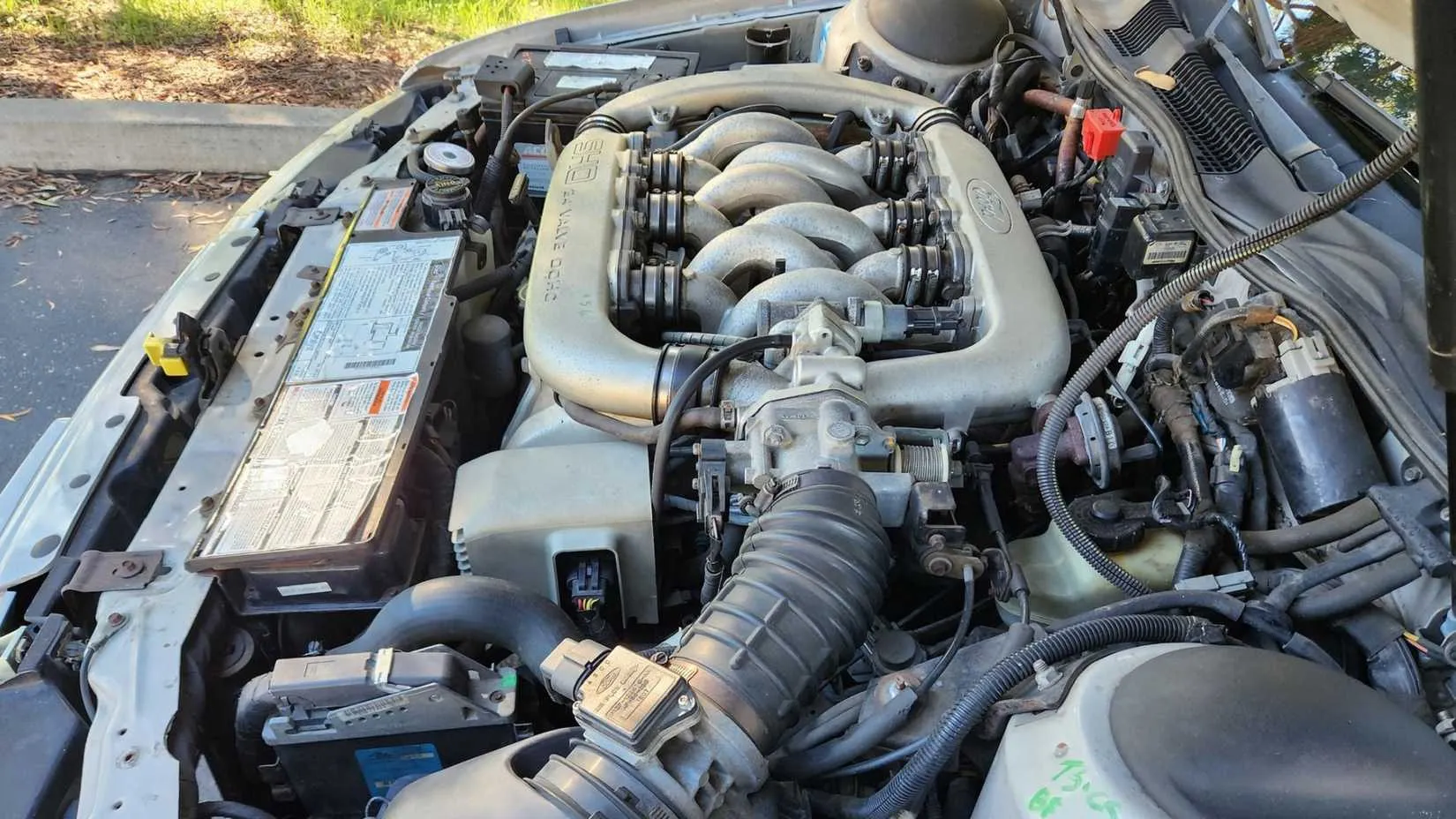 1992 Ford Taurus SHO V6 engine side on road