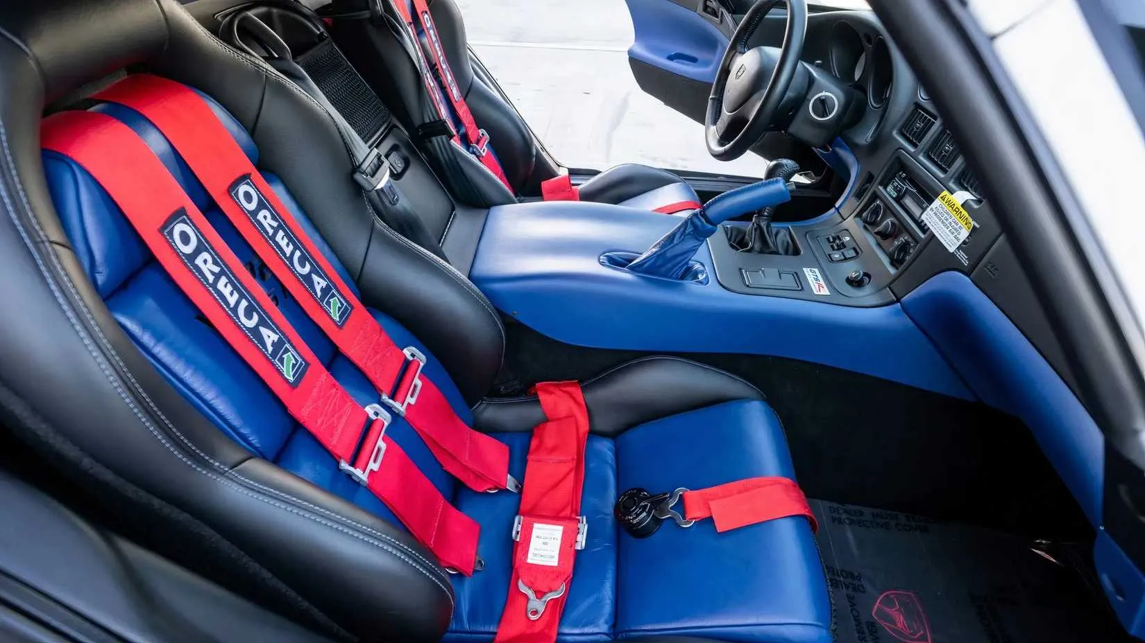 Interior of a 1998 Dodge Viper GTS GT2 Champion Edition with black leather and blue accents