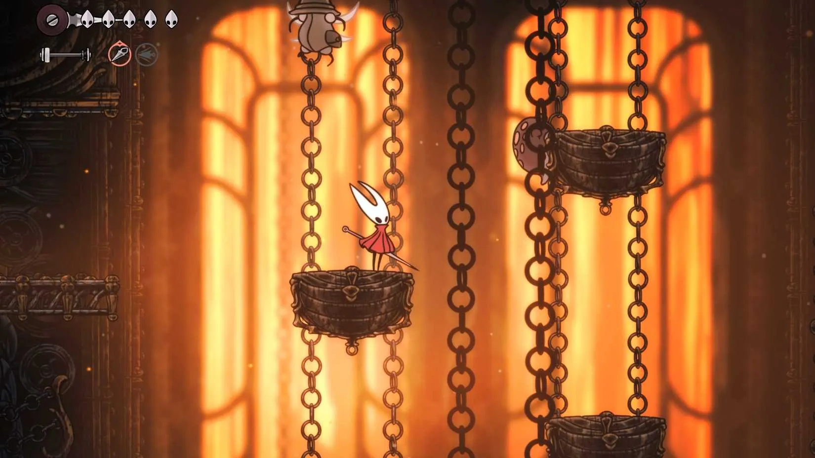 Fighting off enemies on the chained platforms in Hollow Knight: Silksong
