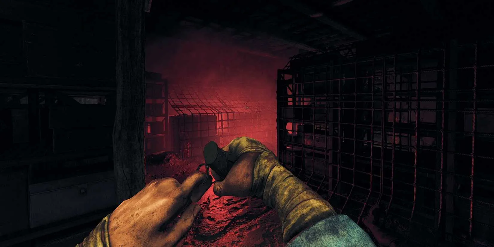 Amnesia The Bunker protagonist holding a grenade