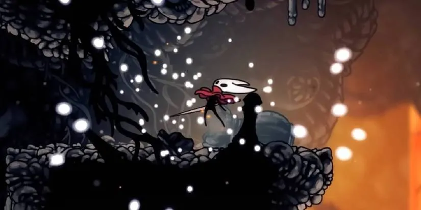 Hornet collecting a Mask Shard to increase max health