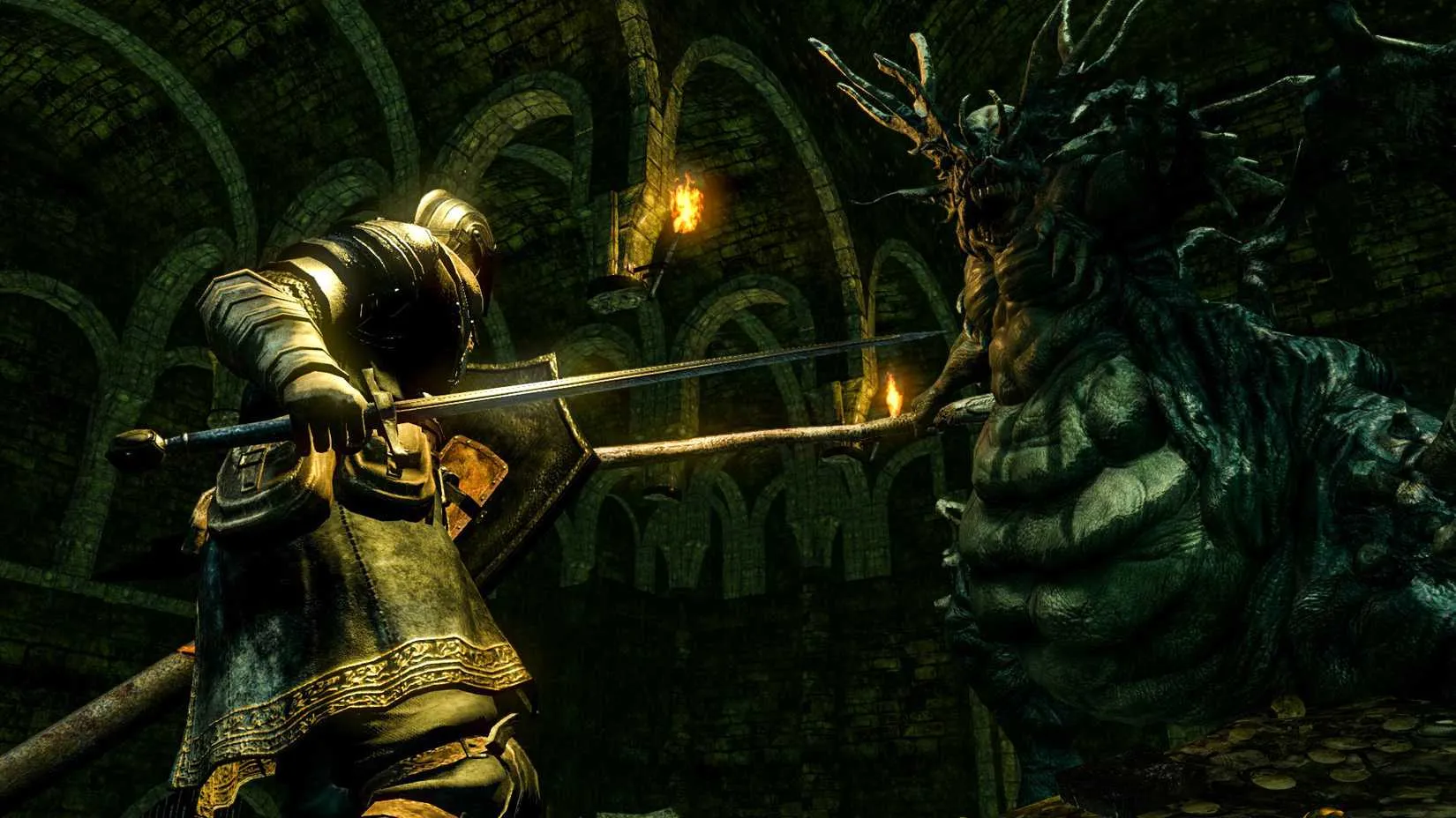 The Asylum Demon looming over the player in Dark Souls Remastered