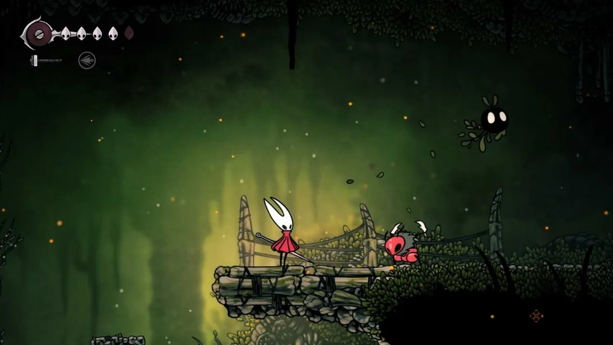 Hornet facing a red ant enemy in Silksong