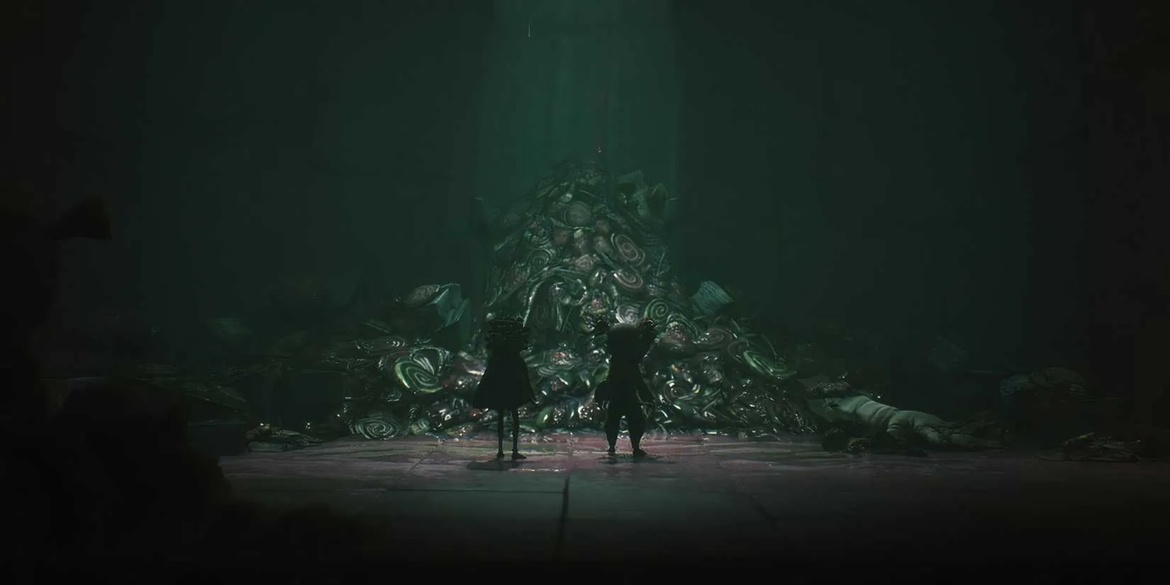 A zombie-like enemy looming in a dark hallway